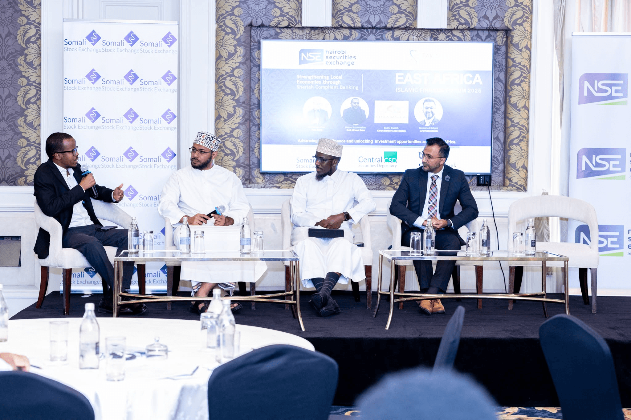 Dr. Ainab on a panel discussing Shariah Compliance
